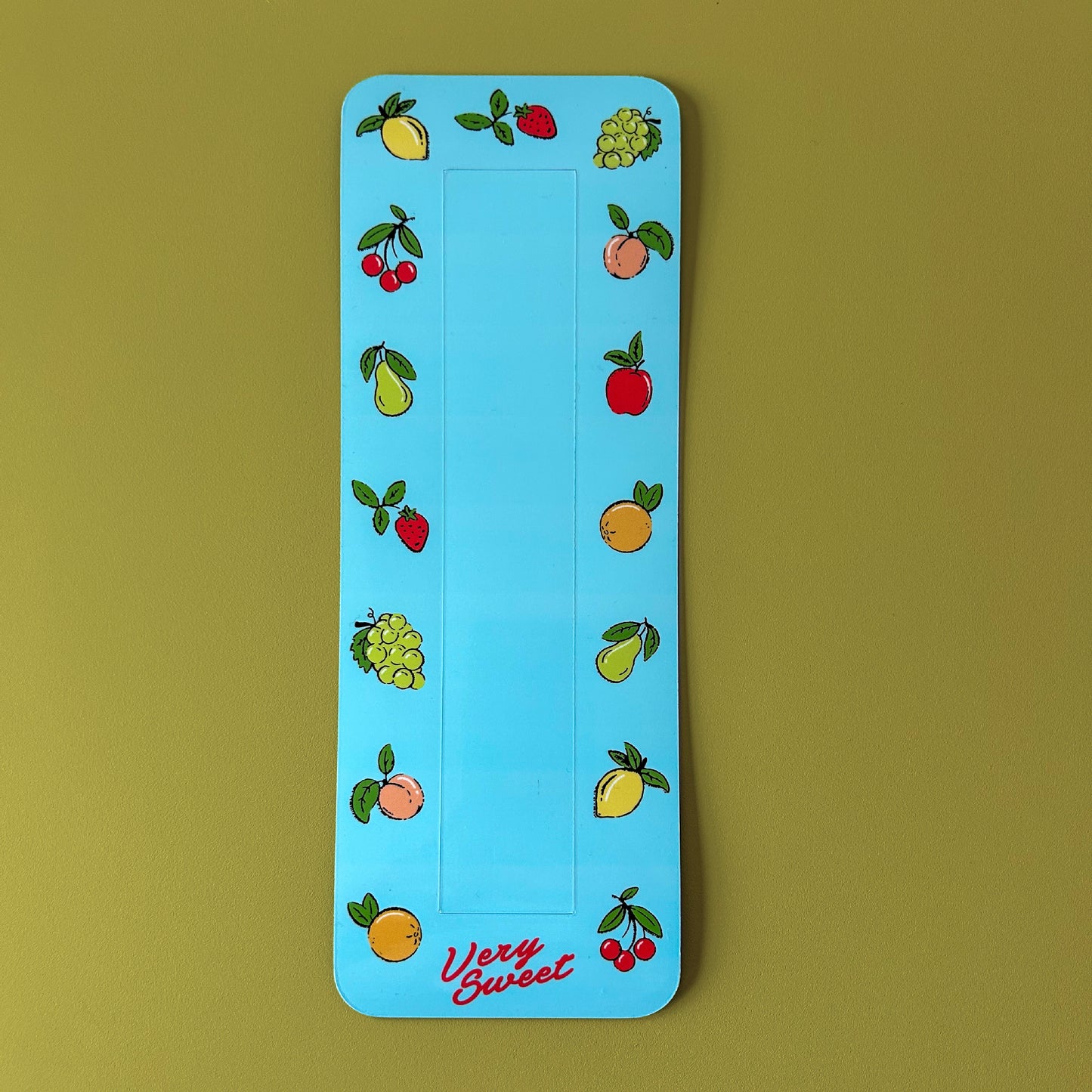 Magnetic frame for 1.5 x 8 inch photo booth strip with colorful fruit design