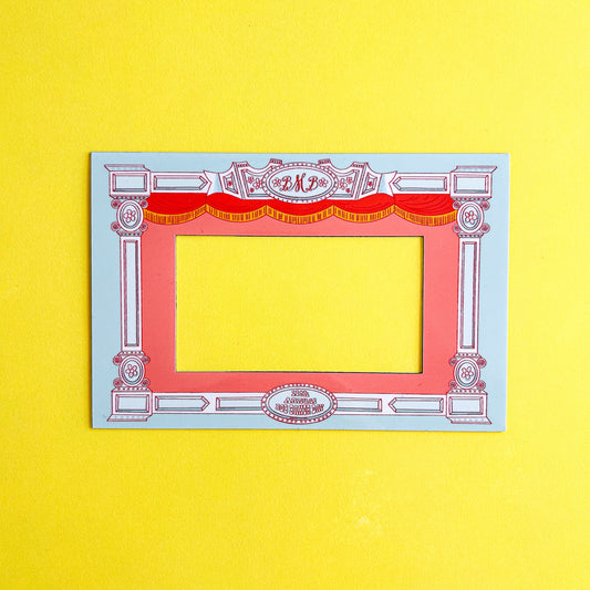 Decorative frame with red center on a yellow background